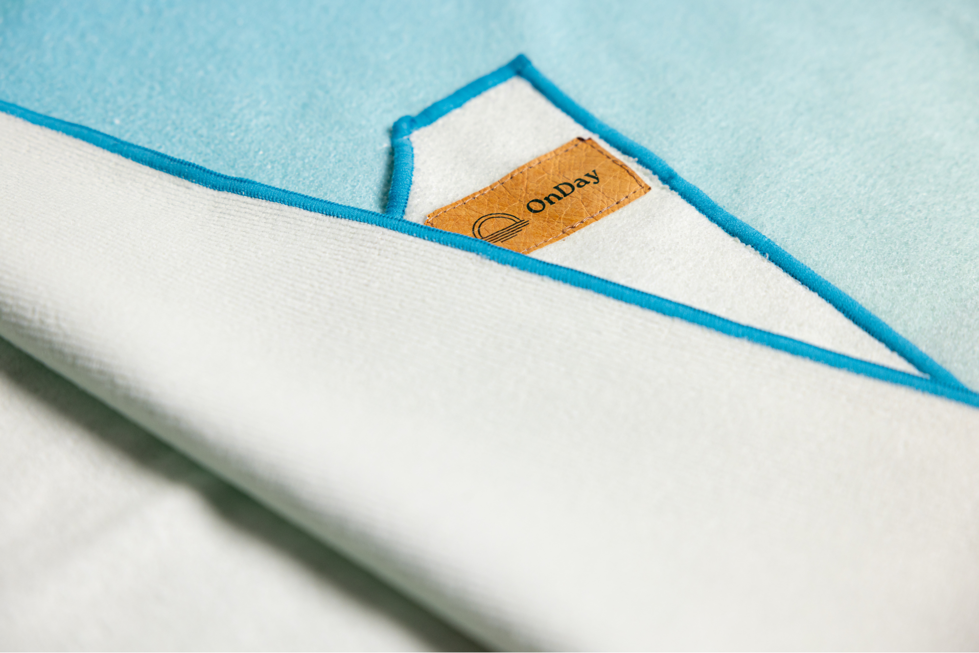 Poncho file close up blue and yellow.